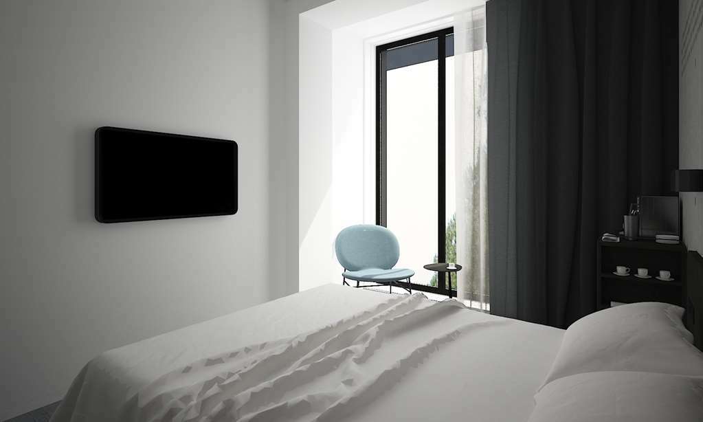 Отель Golden Tulip Design Тбилиси Номер фото